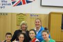 Year 6 pupils Daniel Shone, Millie Isaac, Ruby Howes and Emily Schaverien with WIJPS Headteacher Mrs Andrea Elliker and international rugby player Catherine Spencer