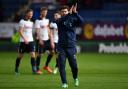 Mauricio Pochettino applauds the fans following Spurs' victory. Picture: Action Images