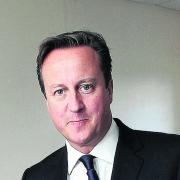 Prime Minister David Cameron calls for calm after a jury found Mark Duggan's shooting by police lawful