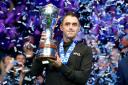 Ronnie O’Sullivan celebrates with the trophy (Mike Egerton/PA)