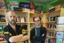 Staff member Mark Collins and Big Green Bookshop co-owner Tim West