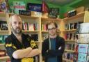 Staff member Mark Collins and Big Green Bookshop co-owner Tim West