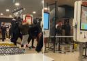 A group was seen fighting inside Wood Green, North London McDonalds.