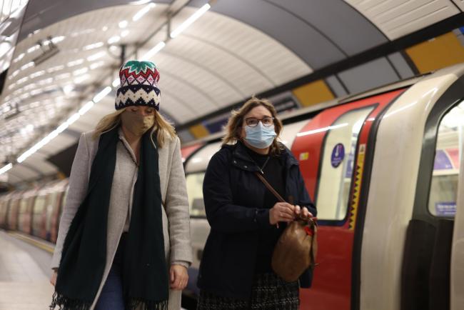 Face coverings are mandatory on public transport and in London's stations. Credit: PA