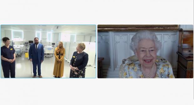 Tottenham Independent: Queen Elizabeth II speaking to Dr Marie Healey, Divisional Director for Surgery and Critical Care; Mr Asef and Mrs Shamina Hussain; and Jackie Sullivan during a video link call (PA)