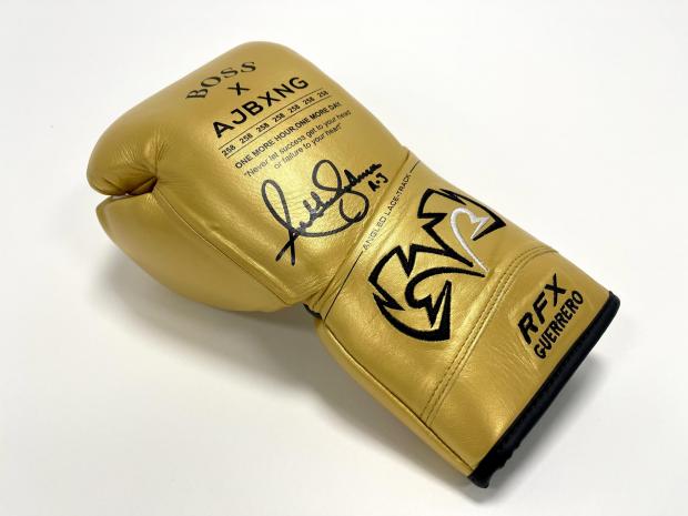 Tottenham Independent: Anthony Joshua’s signed gold glove