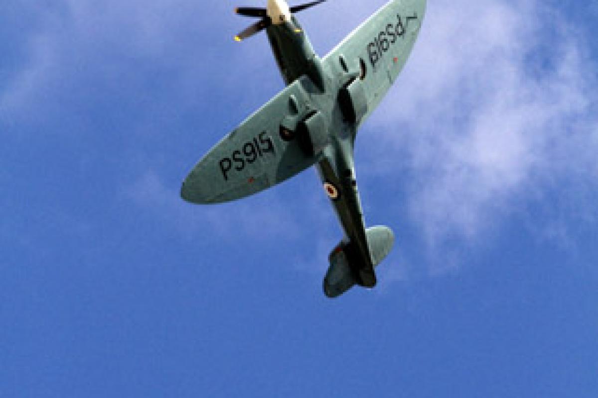 A Spitfire flies over Hendon for the Battle of Britain Memorial Flight