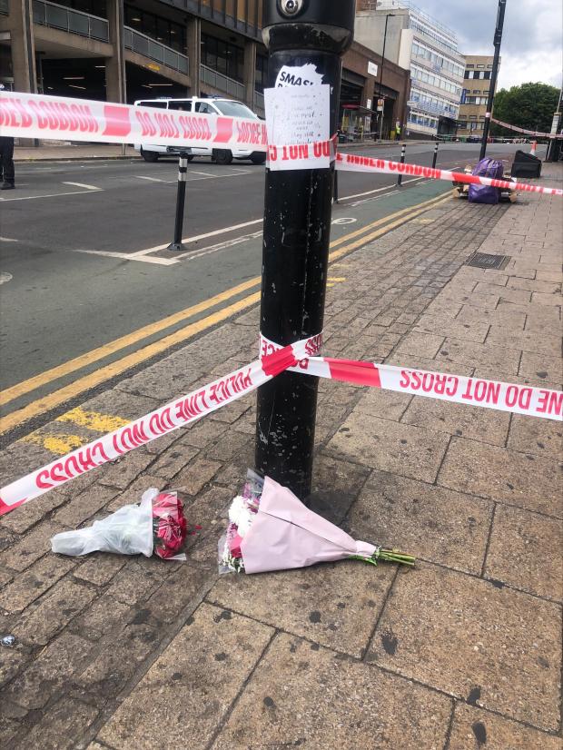 Tottenham Independent: Floral tributes left near the scene of the shooting. Credit: PA