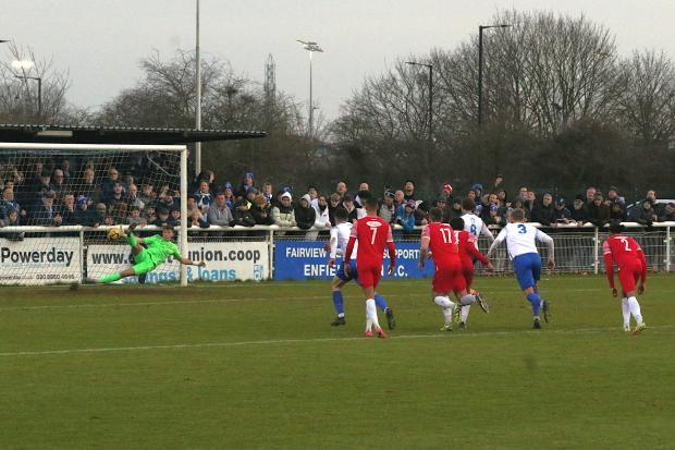 Sam Youngs scores Enfield's penalty against Hornchurch. Picture: PHIL DAVISON