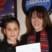 Lynne Featherstone and Christmas card winner Zoom Rockman