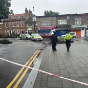 A police cordon is still in place