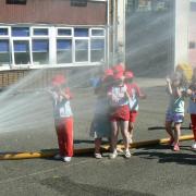 Splashing time for Rainbow members visiting Borehamwood fire station