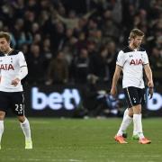 A downcast Eric Dier and Christian Eriksen after last night's defeat at West Ham. Picture: Action Images