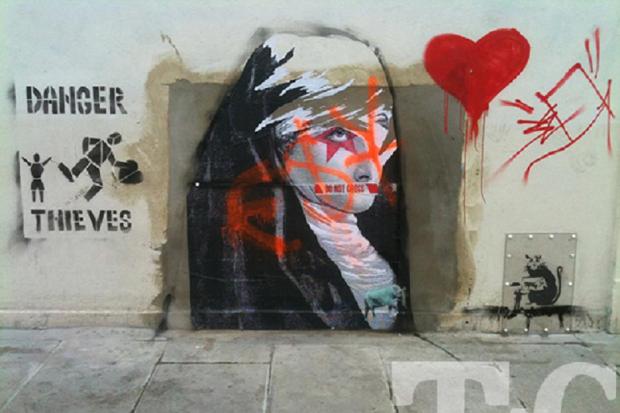 New artwork has appeared on the wall formerly home to the Banksy piece. Photo courtesy of Turnpike Art Group